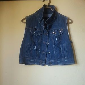 Sleeveless blue jean jacket